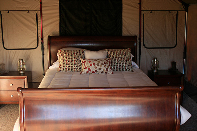 This room features an old sleigh bed.